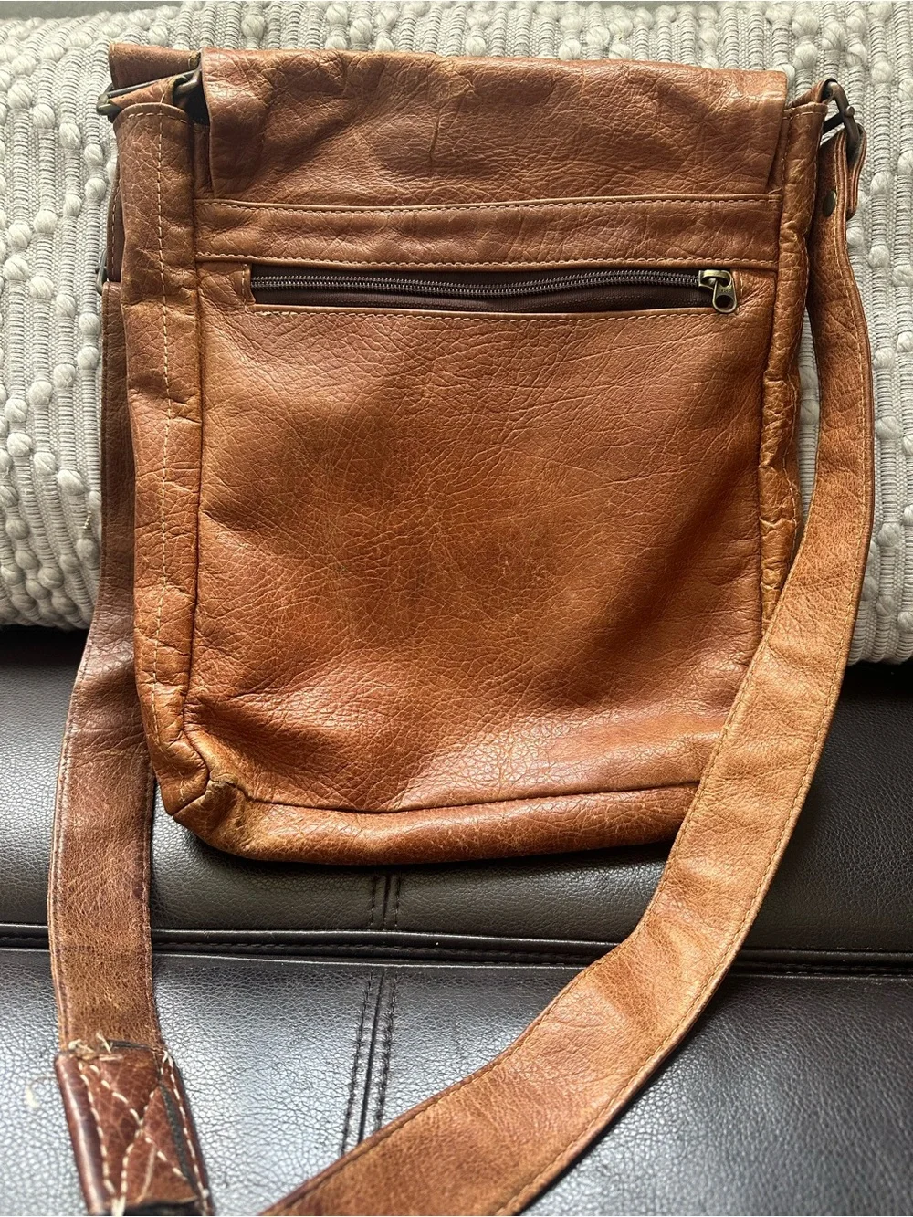 Distressed brown leather crossbody messenger bag